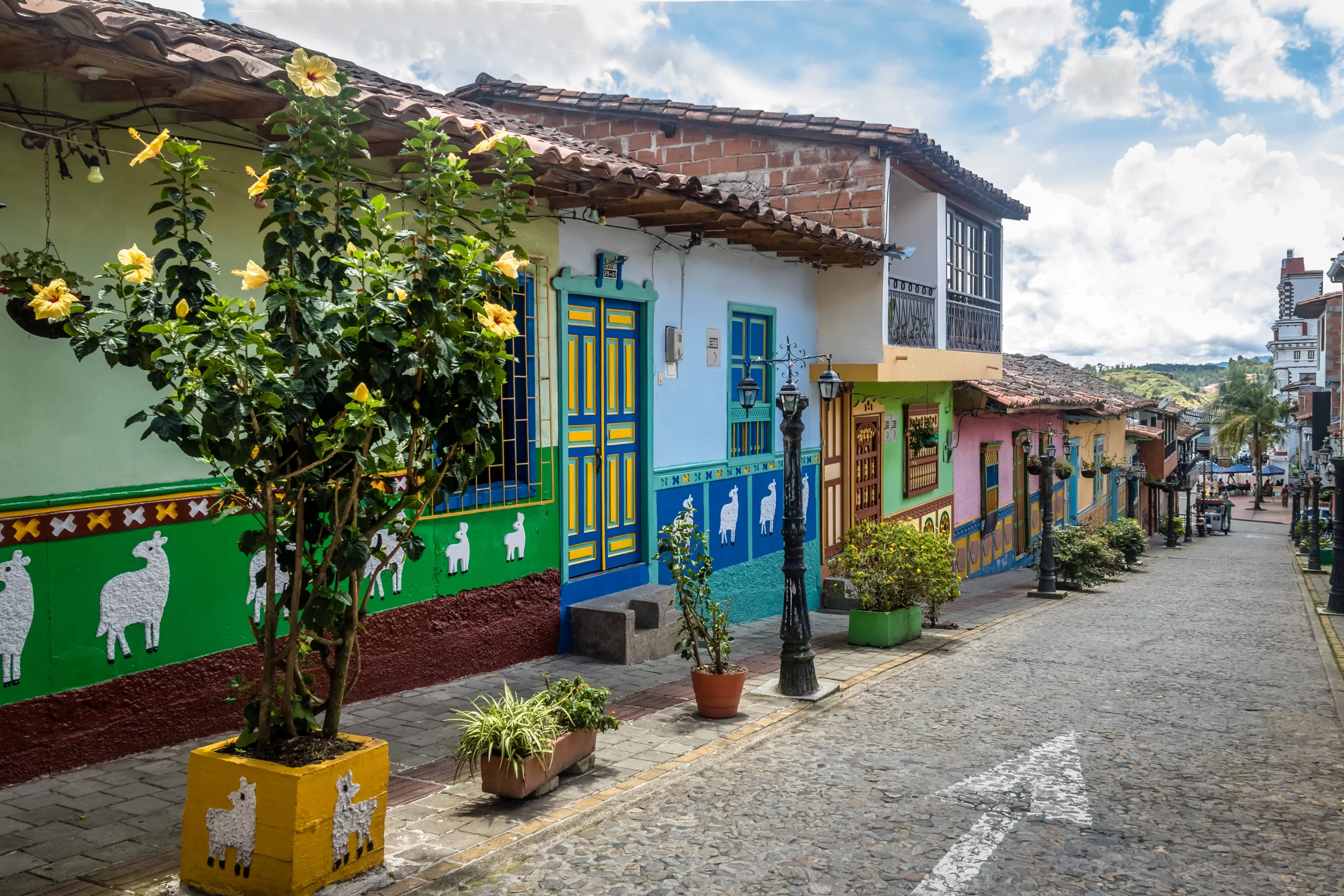 colorful-houses-on-a-cobblestone-street-guatape-2023-11-27-05-19-56-utc